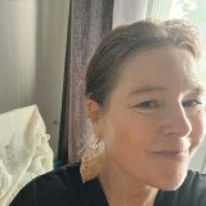 Corinne T.