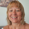 Evelyne M.