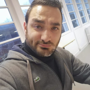 Oguzhan S.