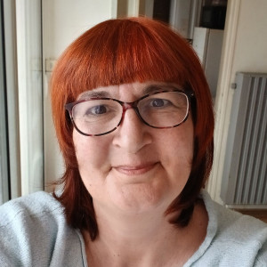 Corinne M.