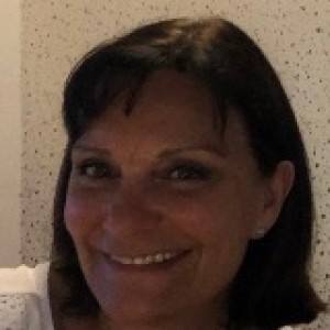Evelyne L.