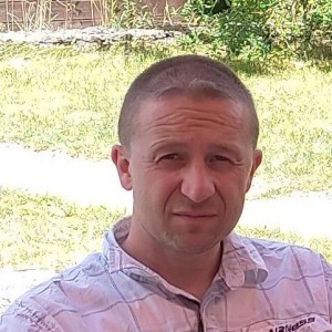 Gregory M.
