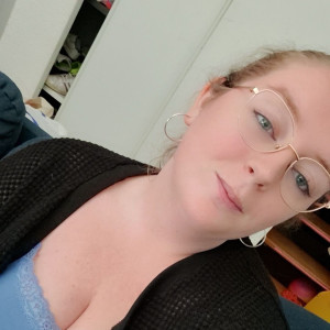 Laura E.
