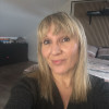 Corinne M.