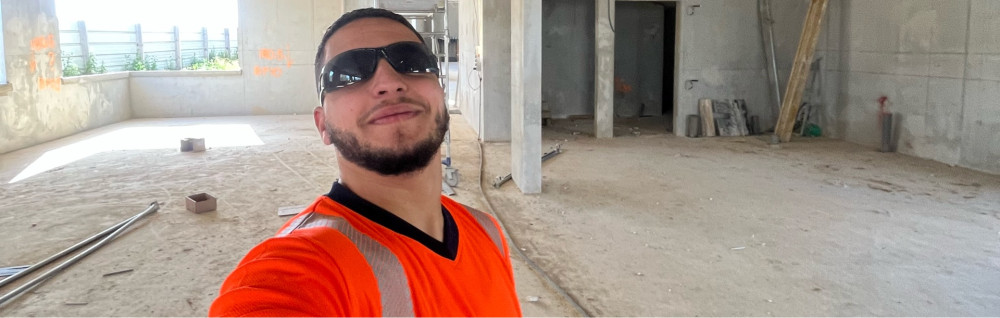 Ali E.
