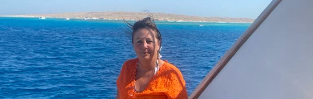 Corinne M.