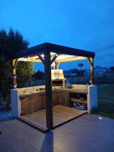 Photo de galerie - Réalisation complète d'une cuisine exterieure