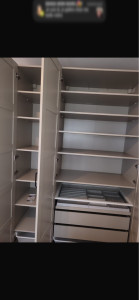 Photo de galerie - Intérieur meuble trois portes 