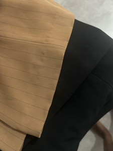 Photo de galerie - Ourlet fait main sur pantalon de ville 