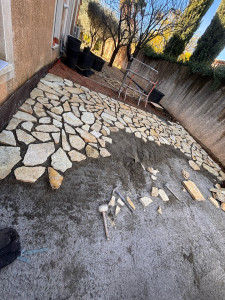 Photo de galerie - Pose porte du lot sur lit de mortier 