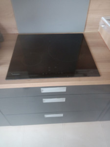 Photo de galerie - Installation de la plaque de cuisson
