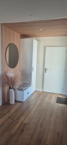 Photo de galerie - Pose de parquet, et mise en place de panneaux décoratif.