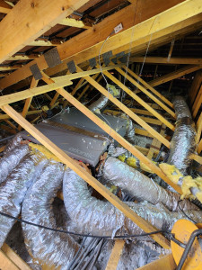 Photo de galerie - Instalation et mise en service d'un système de climatisation Gainable.