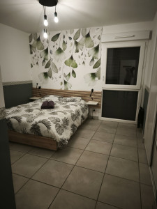 Photo de galerie - Lit et disposition du linge de bain 