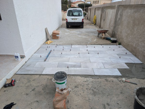 Photo de galerie - Colle de carreau en double encollage 
