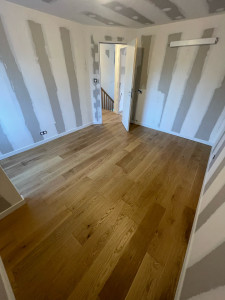Photo de galerie - Pose parquet flottant chambre 