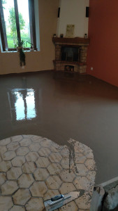 Photo de galerie - Application d'un ragréage fibré 