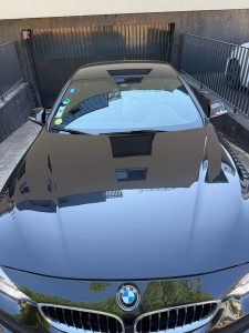 Photo de galerie - Polissage d’un capot bmw série 4 ✅