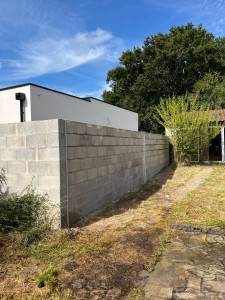 Photo de galerie - Montage mur parpaing 