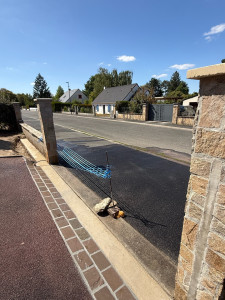 Photo de galerie - Créations d’une semelle en béton, pose d’une chaînette en pavé grés et pose de 4 piliers et parements 