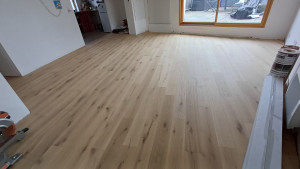 Photo de galerie - Pose 35m2 parquet contrecolle