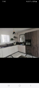 Photo de galerie - Condamnation d'une ancienne porte avec des brique de béton cellulaire + découpe et pose d'une verrière aluminium 