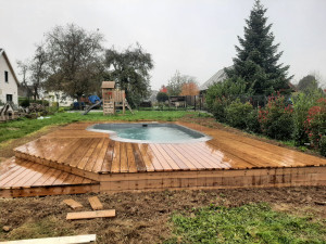 Photo de galerie - Aménagement de piscine, terrasse et bois 
