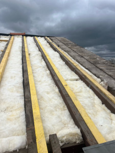 Photo de galerie - Réalisation d’une couverture, isolation et renforcement de la charpente