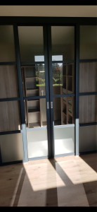 Photo de galerie - Montage de meubles de dressing et porte baie vitrée 