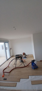 Photo de galerie - Pose du stratifié dans le séjour