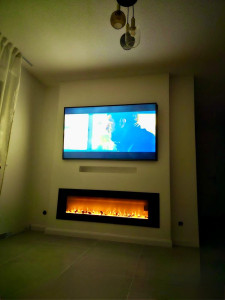 Photo de galerie - Réalisation d’une niche de 15 cm d’épaisseur pour fixation TV, cheminée, électrique et emplacement, barre de son