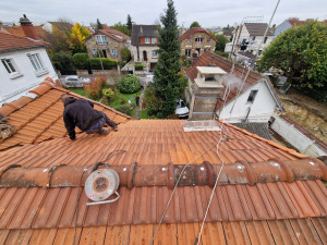 Photo de galerie - Changement de tuiles isolation écran sous toiture Pose liteaux 