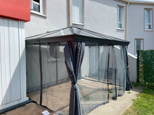 Photo de galerie - Montage pergola EXT et fixation au sol 
