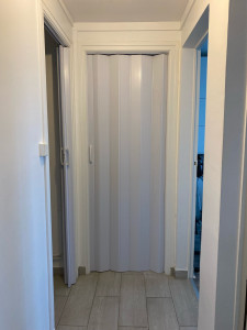 Photo de galerie - Pose de porte accordéon 
