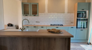 Photo de galerie - Plaques de cuisson au gaz et évier installés.