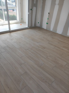 Photo de galerie - Pose carrelage imitation bois