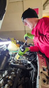 Photo de galerie - Remplissage huile de boite 