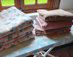 Photo de galerie - Repassage draps. 
