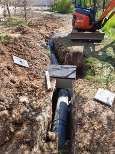 Photo de galerie - Terrassement et pose de PVC diamètre 300 sur 70 m de long pour un lotissement