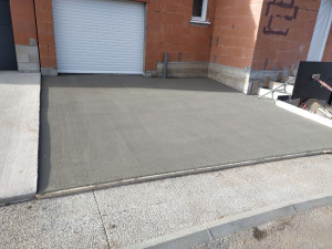 Photo de galerie - Coulage rampe entrée de garage finition balier 