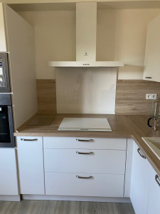 Photo de galerie - Mise en place d’une hotte de cuivre 