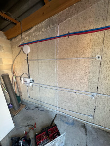 Photo de galerie - Raccordement d’un circuit lumière et prise au niveau d’un tableau avec tube iro