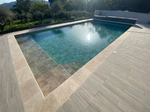 Photo de galerie - Rénovation complète d’une piscine, fond remonté, création plage avec escalier, pose d’une membrane armée 