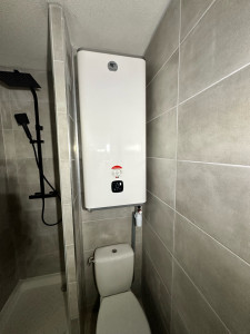 Photo de galerie - Installation chauffe eau plat Thermor 