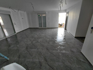 Photo de galerie - Pose d’un sol intérieur en carrelage 