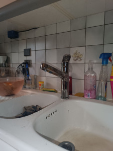 Photo de galerie - Pose d'un robinet avec une douchette pour une cuisine 
