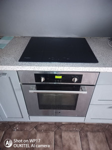 Photo de galerie - Pose d'une nouvelle plaque cuisson induction 