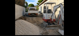 Photo de galerie - Rénovation façade en pierre ainsi que maçonnerie avec création d’un chemin d accès 