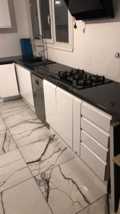 Photo de galerie - Pose d’une cuisine et de carrelage 