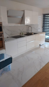 Photo de galerie - Cuisine complète avec carrelage